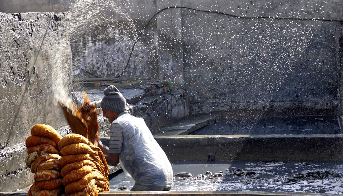 man and spray.