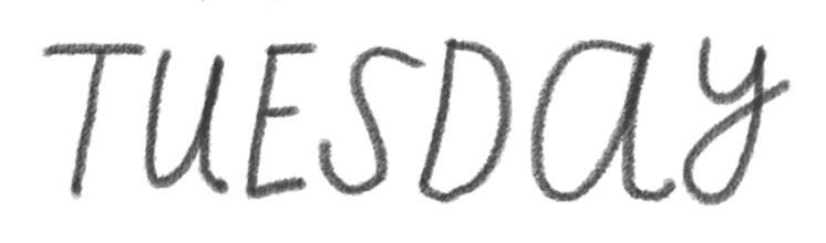 Handwritten text displaying the word 'TUESDAY' in a playful, cursive style.